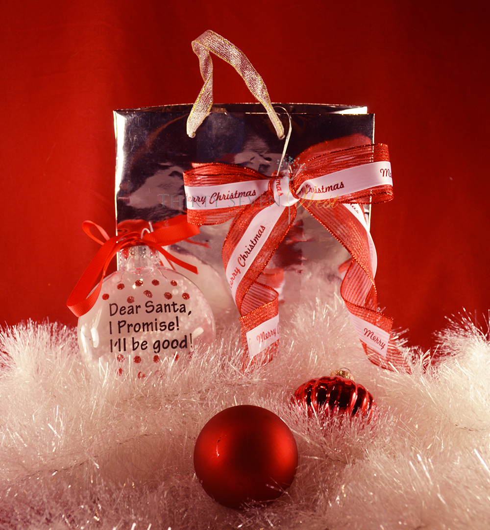 Custom gift wrap using a gift bag and personalized custom ribbon or custom Logo Ribbon.