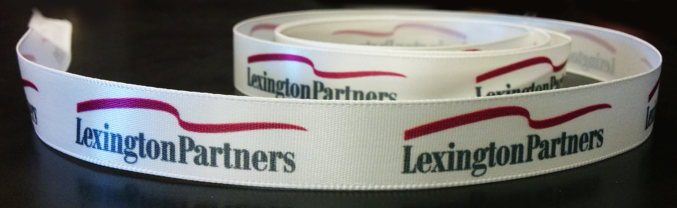 multi color logo ribbon, brand's logo into ribbon designs,  product packaging ribbon, gift wrapping ribbon, ribbon customization, corporate gifts ribbon, marketing campaign ribbon, custom logo ribbons