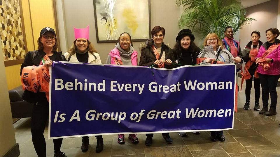 womens-march-on-washington-2017-sashes-behind-every-great-woman-is-a-group-of-great-women-banner-by-grace-killelea-bus-captain-philly.jpg